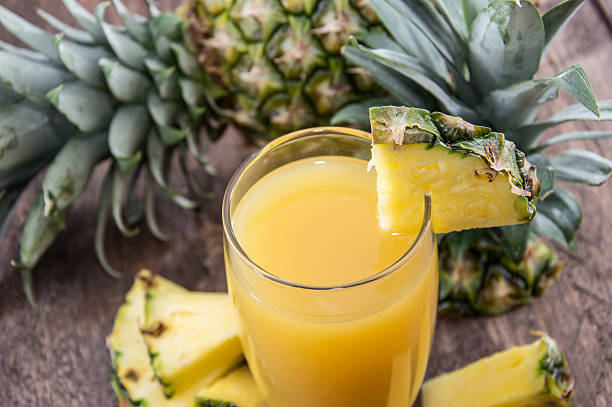 Fresh Made Pineapple Juice With Fresh Pieces Of Pineapples